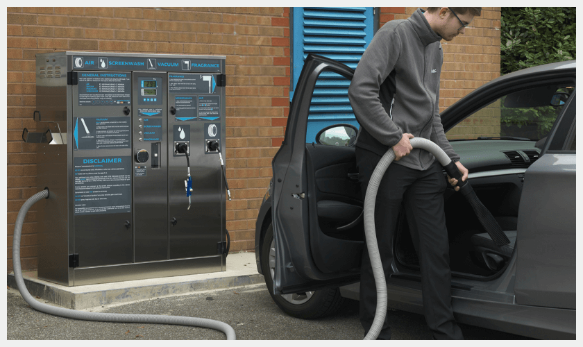 PCL - Man using vaccum option on Multi-unit on a Forecourt