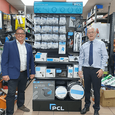 PCL's Michael Dooker with Raymond Goss, owner of Newry-based P&R Wholesale